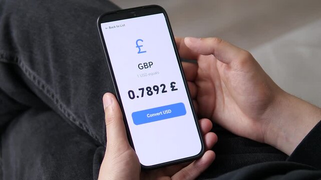 Close-up of a bright, clean mobile dashboard showing USD to global currency rates. Large blue font highlights the 0.7892 GBP value. Perfect for modern design showcases, finance software, and user