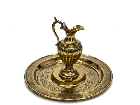 Ornate brass pitcher and tray set for antique decor and luxury design, isolated on white background