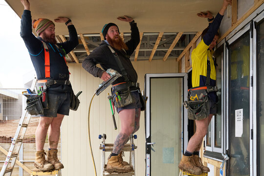 Carpenters at work on construction site