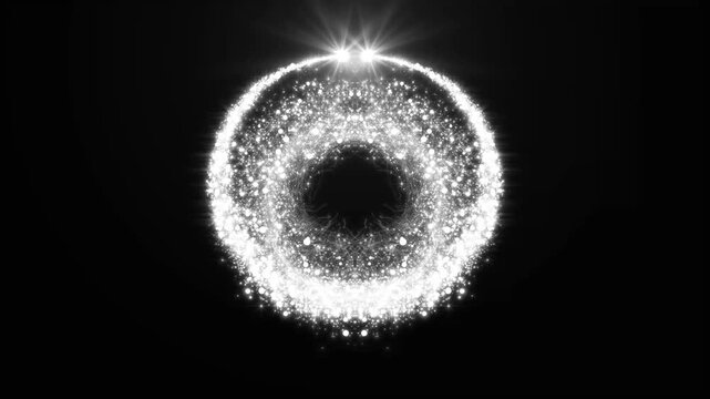 Glowing white particle ring expanding with double lens flares on a black background