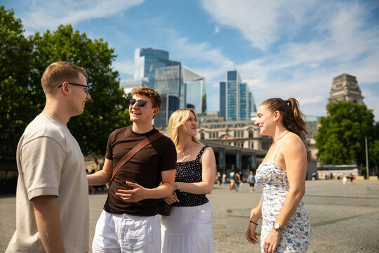 Friends socializing in the City of London financial district