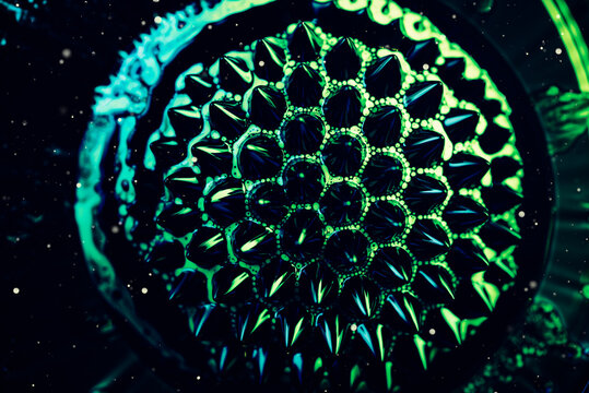 Abstract background with particles flying over mysterious pattern
