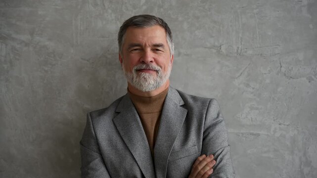 Success concept. Stylish bearded man in a suit in modern office