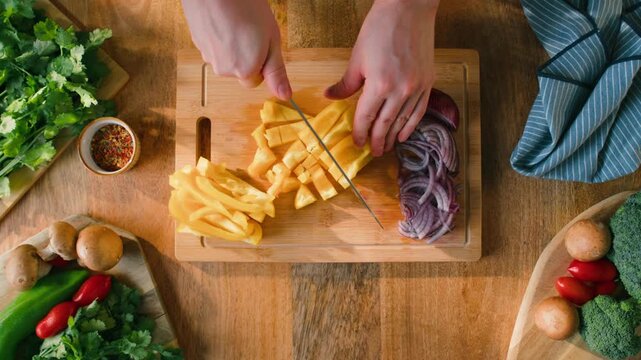 Man cut red onion, Chef hands with knife for onion, cutting and preparation with cooking for dish. Restaurant, culinary service and cook with skills for catering, business and hospitality by closeup