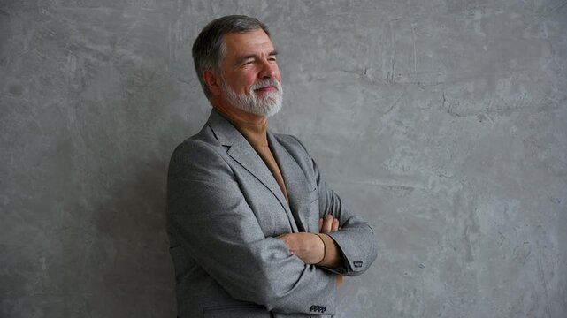 Success concept. Stylish bearded man in a suit in modern office