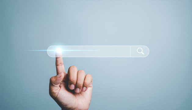 Finger presses the search button in the search bar