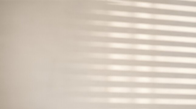 Parallel shadow lines falling on light beige wall