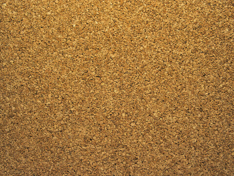 Cork board texture background with natural brown surface. Natural, full frame, macro shot with details of the material