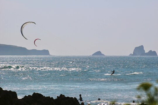 Liencres Cantabria Spain Europe July 11 2026 Kitesurfing off the beach of Playa de Valdearenas on a hot July day on the north coast of Spain