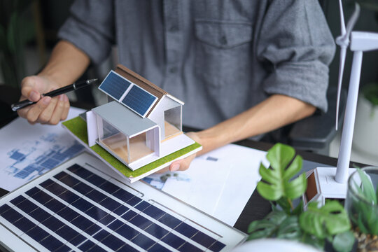 Professional Architect Designing Sustainable Eco-Friendly Modular Home.