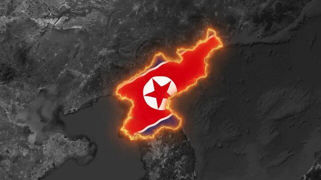 North Korea map silhouette glowing with intense fire energy on a dark earth background for dynamic digital motion video footage