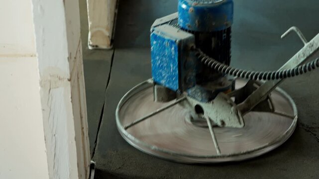 Power trowel finishing cement floor screed surface