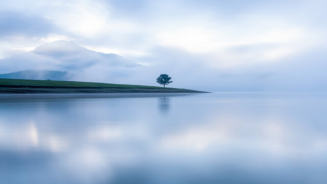 AI Generated Peaceful Lake Landscape Surrounded by Green Nature