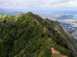 Aerial view of the Kuliouou Ridge with hazy coastline in the distance, Oahu © Zach