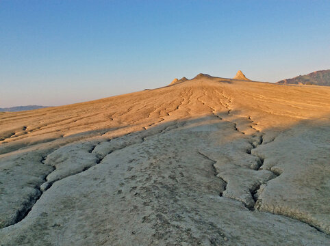 Berca mud volcanoes, Buzau, Paclele Mari, Romania: Mud volcano landscape with cracked dry earth and gullies