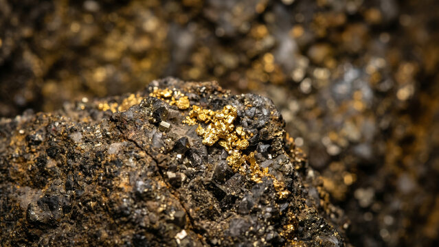 Extreme macro close-up of raw gold nugget texture, shiny yellow precious metal surface detail and wealth concept background.