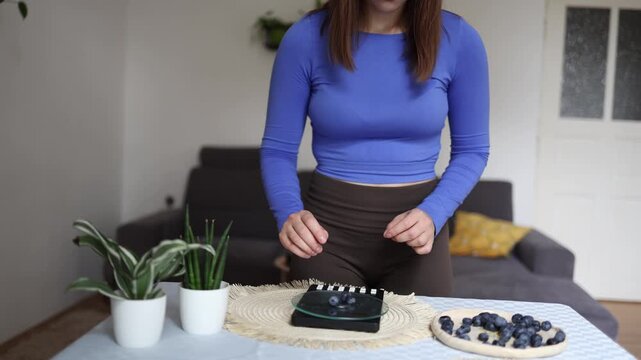 Social media fuels calorie obsession as athlete carefully weighs only a few blueberries Refusing to eat more until every gram fits the daily nutrition plan