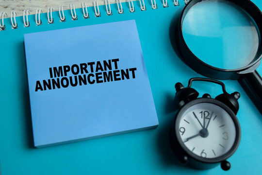 Concept of important announcement write on sticky notes isolated on Wooden Table.