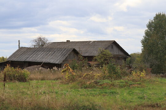 Abandoned, uninhabited houses in old villages from the time of collective farms and collectivization in the Soviet Union. 1930-1940-1950s, Gasniki village, north of the Kirov region, Russia.
