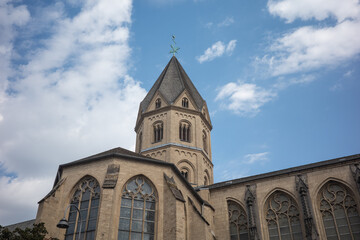 Obraz premium View of church tower under cloudy sky during daylight