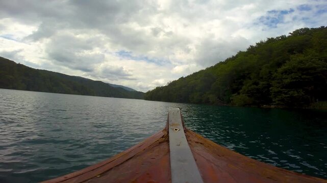 Point of view of a small boat cruising on the Plitvice Lakes in the Plitvice lakes National Park, Croatia