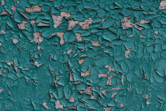 old vintage cracked wall, pelling paint. Aged wood surface, pattern.Worn blue texture.