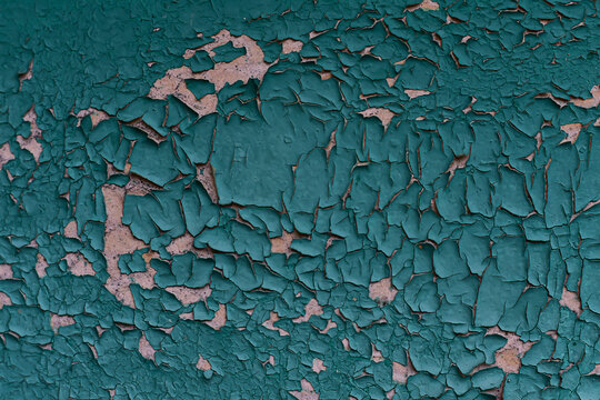 old vintage cracked wall, pelling paint. Aged wood surface, pattern.Worn blue texture.
