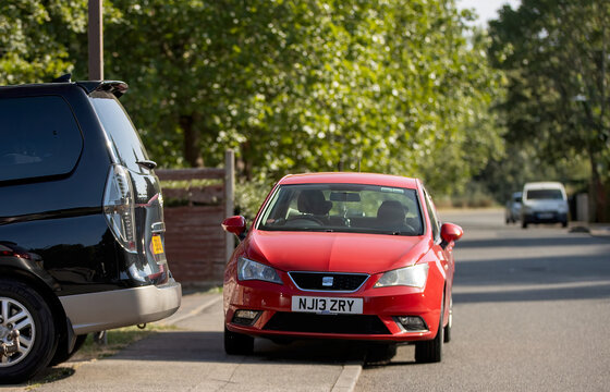 Milton Keynes,UK - July 16th 2025: cars parked blocking the pavement