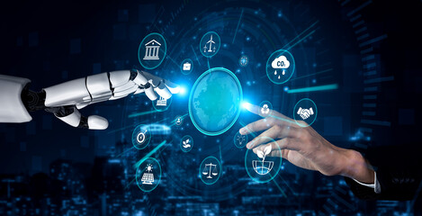 Fototapeta premium Futuristic Interaction Between Robot Hand and Human Hand with Digital Icons Symbolizing Technology, Finance, and Communication. Sentient.