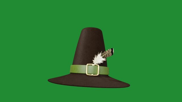 Traditional brown pilgrim hat with feather and buckle on green screen background for thanksgiving holiday design