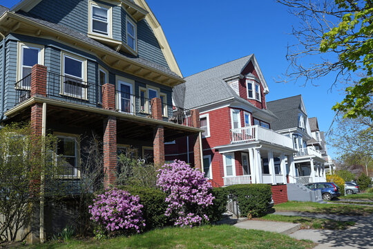 Street of colorful houses with gables and large front porches