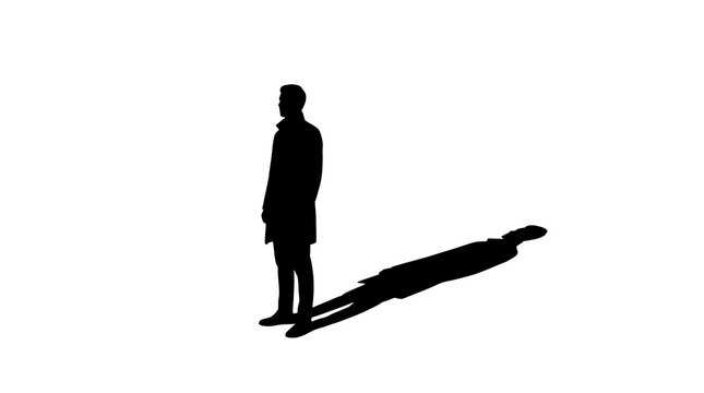 Minimalist silhouette of a standing man casting a long shadow on a white background