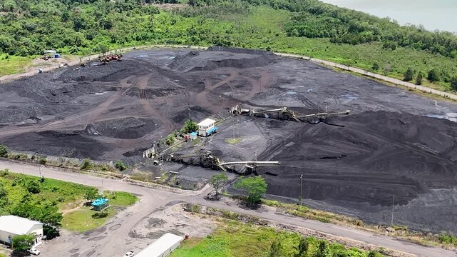 Coal is stockpiled and transported at the waterfront in Kotabaru, South Kalimantan