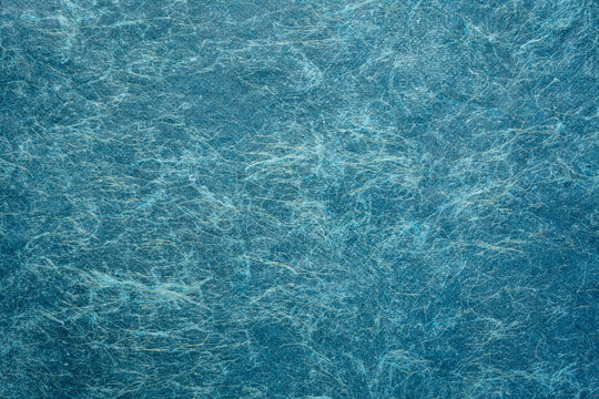 texture of blue Brazilian banana paper with lightly raised fibers
