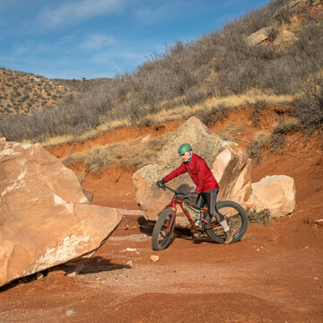 riding a fat bike on mountain desert trail in Red Mountain Open Space in northern Colorado, late fall scenery