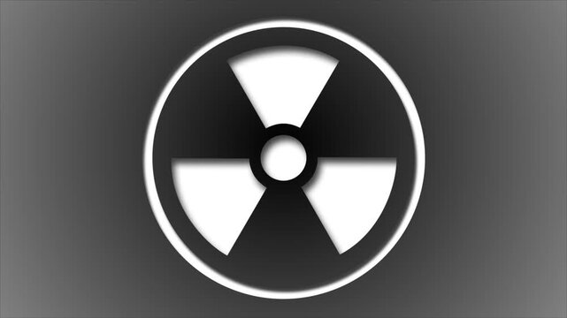 Abstract animation of rotating radiation and radioactivity symbol on grey background.