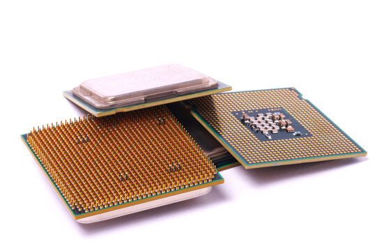 Collection Of Computer Processors Displaying Different CPU Contact Technologies Isolated