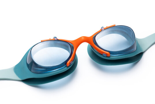 Blue and orange swimming goggles isolated on white background, close-up