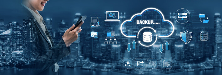 Fototapeta premium Businesswoman Holding Smartphone with Cloud Backup Concept and Technology Icons Over Cityscape at Night Sigmoid