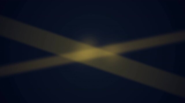 Abstract crossing yellow light beams in dark night sky background.