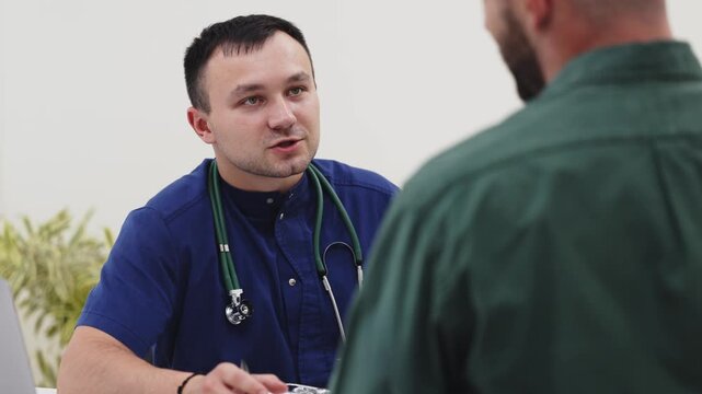 Family physician explaining treatment recommendations to a young patient. Concept healthcare, medical guidance, patient communication, family medicine, clinical practice.