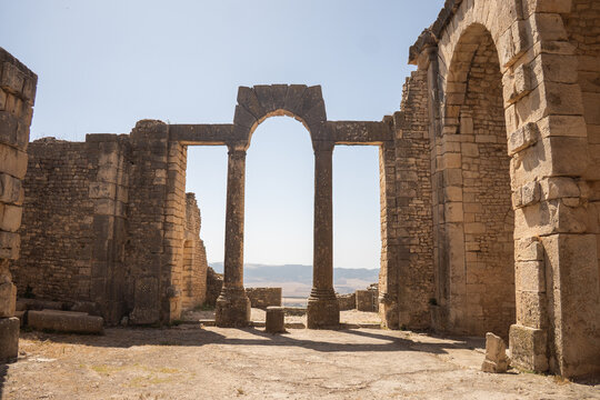 Columns supporting a lintel at the archaeological site of Dougga, in Teboursouk, outside of Tunis, Tunisia
