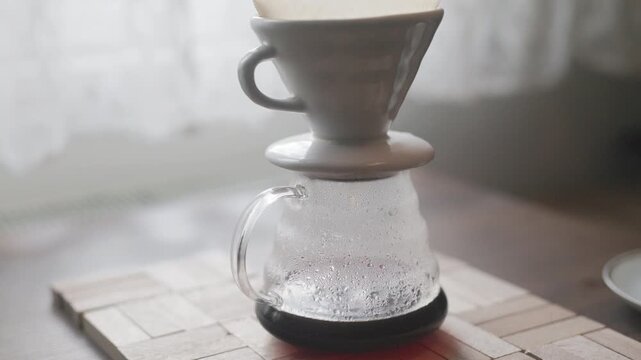 Close-up of V60 drip coffee brewing method with pour over