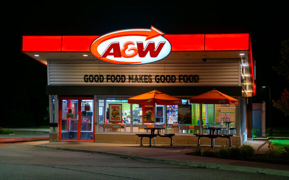 Fort Erie, ON, Canada - Jun 25, 2026: Night view of A&W retail location located at 155 Garrison Road, a Canadian fast‑food burger & root beer retailer with over 1,000 locations nationwide