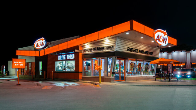 Fort Erie, ON, - Jun 25, 2026: Night view of A&W retail location located at 155 Garrison Road, a Canadian fast‑food burger & root beer retailer with 1,000+ locations nationwide