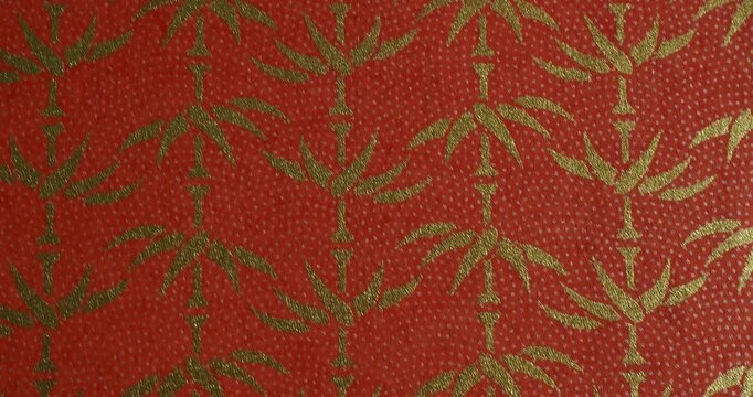 Traditional Japanese patterns &ndash; Gold Bamboo Motif on Red Background Vertical Motion - Vertical movement from bottom to top creates a refined looping decorative animation.