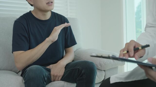 Man hold hand in front of private parts feeling discomfort and consult doctor. Venereal, testicular cancer. bladder problems, erectile dysfunction, premature ejaculation, prostate cancer