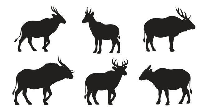 Black silhouettes of deer walking side.