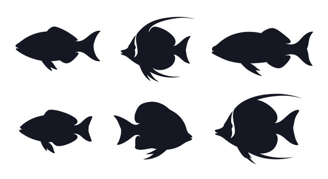 Collection of black fish silhouettes swimming.