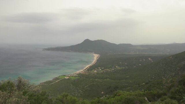 Spiaggia di Portixeddu Beach In The Coastal Town Of Buggerru In Western Sardinia, Italy. Aerial Wide Shot